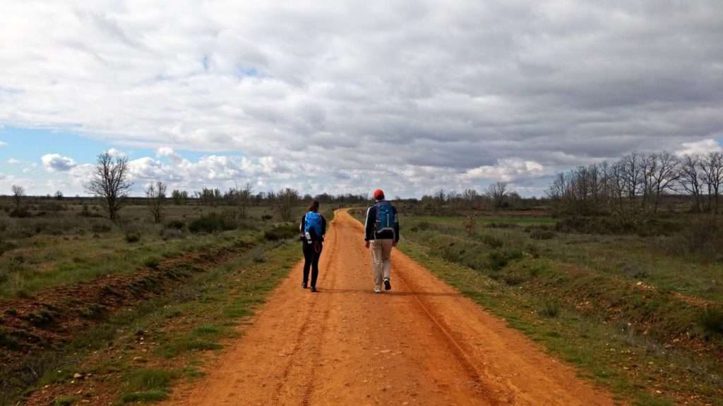 Petya and Nace are walking along Leon excited on their first day of Camino de Santyago.