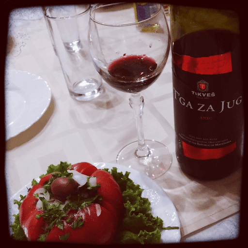 Fresh tomato and a bottle of local wine